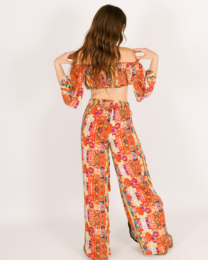 סט: טופ כיווץ + מכנס ארוך חצי רשת, משי כתום