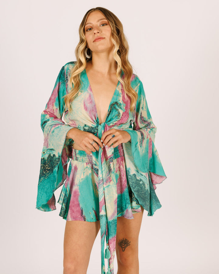 סט: חולצת בטן מעטפת + מכנס מטריה קצר, טורקיז סגול נמרח