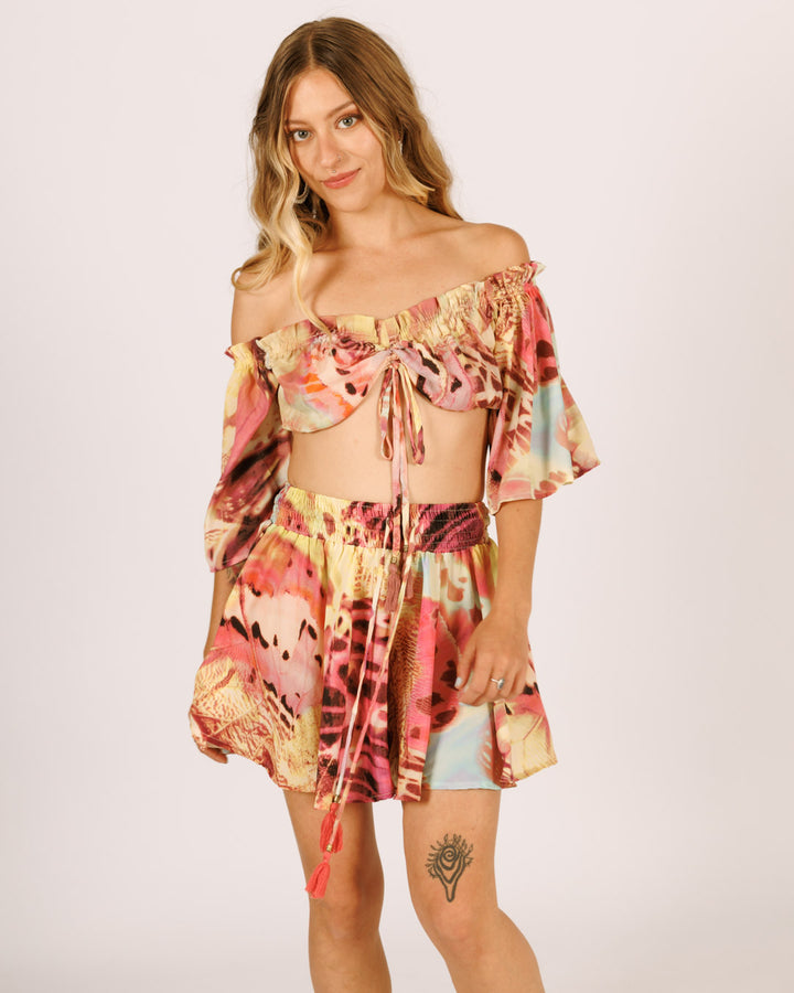 סט: טופ כיווץ + מכנס מטריה מידי, פרפר ורוד